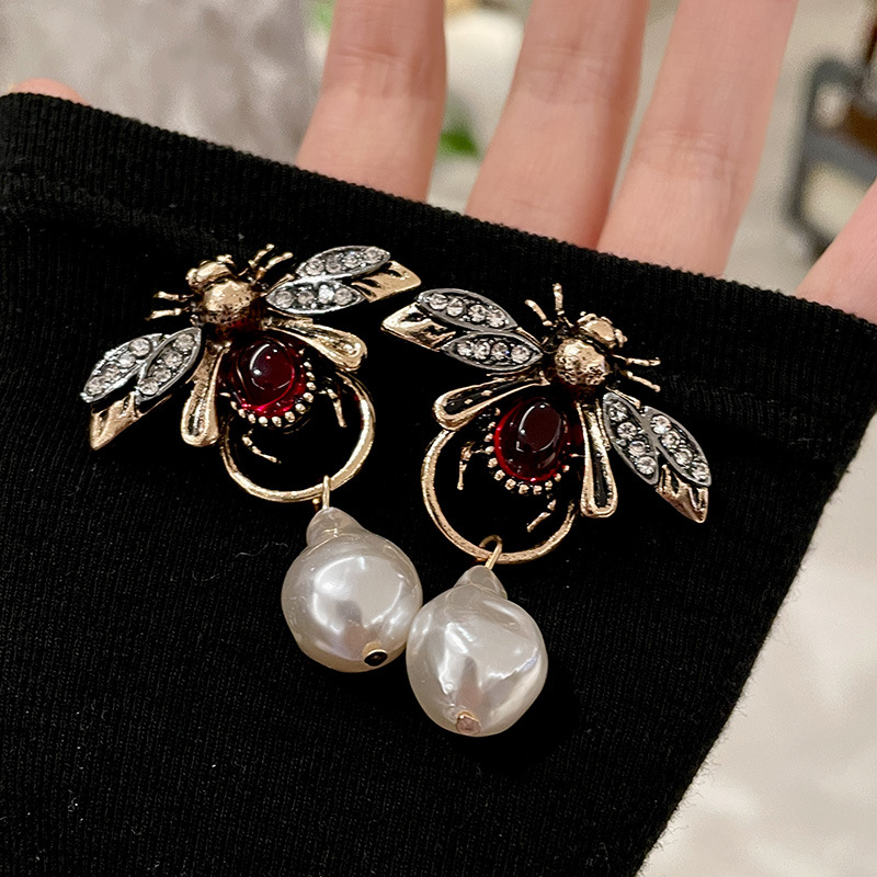 خمر علة الحشرات استرخى أقراط م - مراجعة Vintage Fashion Bug وسعره